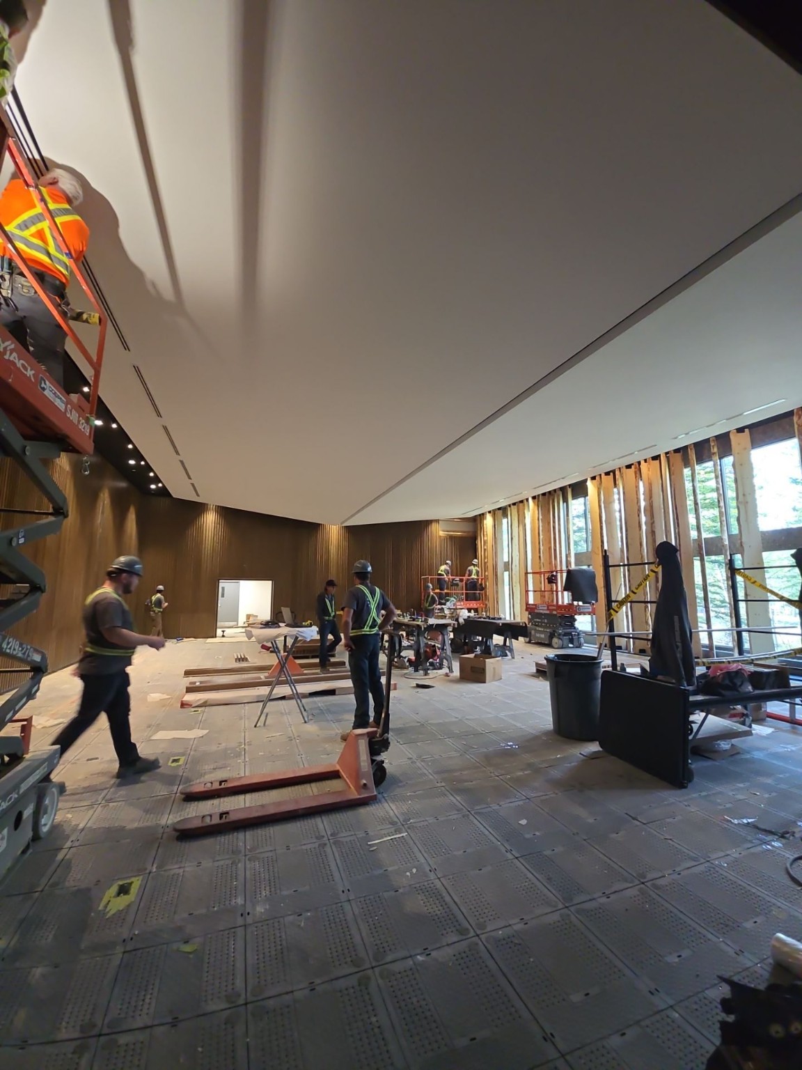 G7 Kananaskis construction team working below completed ceiling planes